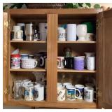 Cabinet full of cups and mugs