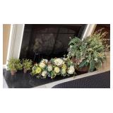 Floral decor on mantel and hearth