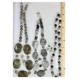 3 gemstone necklaces and earrings