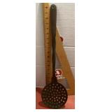 Large brass strainer spoon