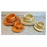 Two 6-piece Fiesta place settings --orange/ivory