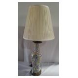 Porcelain oriental  decorative lamp with shade.