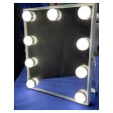 Vanity mirror with touch screen buttons