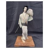 Vintage hand made samurai doll on wood base