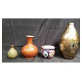 Group of ceramic vases, some marked