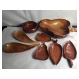 Group of eight hand carved wooden bowls