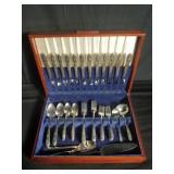 WM. Rogers silverware set with case