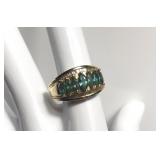 14kt gold ring with diamond and green stones