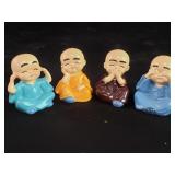 Set of 4 Polyresin Laughing Buddha figurines for