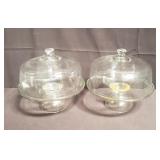 Pair of glass pedestal cake stand and coverings