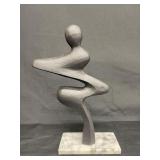 Abstract metal art on marble base