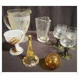 Group of glass pitchers, vase, and glasses