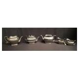 Group of silver-tone ceramic tea set items