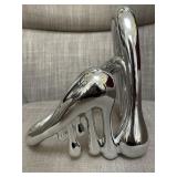 Metallic silver-tone abstract figurine