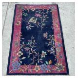 Vintage handmade floral rug