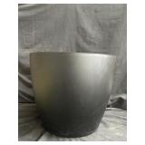 Black plastic cylinder planter