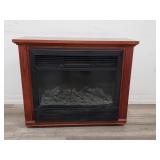 Heat surge electric fireplace heater