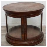 Vintage end table cabinet with curved glass