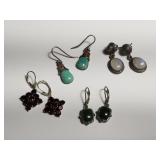 Group of sterling silver earrings with