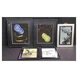 Group of framed embroidery, slate, & prints box