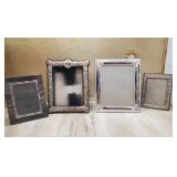 Group of silver plated photo frames and picture