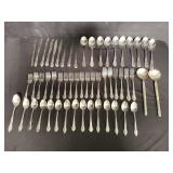 Group of stainless steel flatware