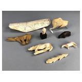 Collection of Resin Reproductions of Bone Carvings