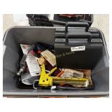 Tote with caulk gun, tapes