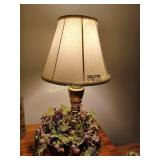 Brass lamp with greenery