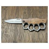 Brass Knuckles/Paperweight w/ Knife