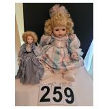 Pair of Porcelain Dolls