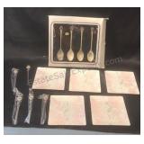 Enameled appetizer plates and metal spoons and