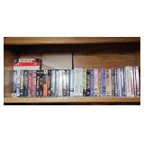 Shelf Lot of VHS Tapes & DVDs