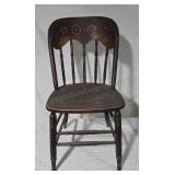 Pinewood chair with punched wood seat and back