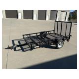 Ramp trailer with side rails