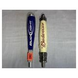 Two ï¿½ classic Budweiser and Bud Light tap handles