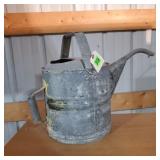 Galvanized watering can