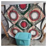 Queen size quilt, storage tote included