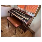 Electric organ, bench, sheet music included