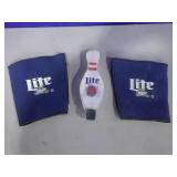 Lite Tap pull and pitcher cozies