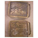 two 1976 stamped Colt belt buckles