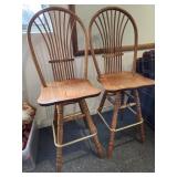 two oak bar stools