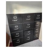 three black file cabinets