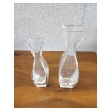 Two clear glass square top flower vases