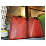 Two 5 gallon plastic gas cans, used oil storage