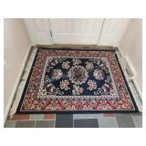 Navy blue 4 ft 1 in x 5 ft 8 in area rug