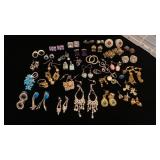 35+ pairs of pierced earrings with divided box