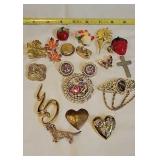Brooches. 1 with clip on earrings. Scarf rings