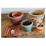 Ceramic & plastic pots. 12" plant caddy