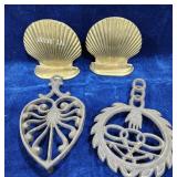 Brass shell bookends,  Trivets